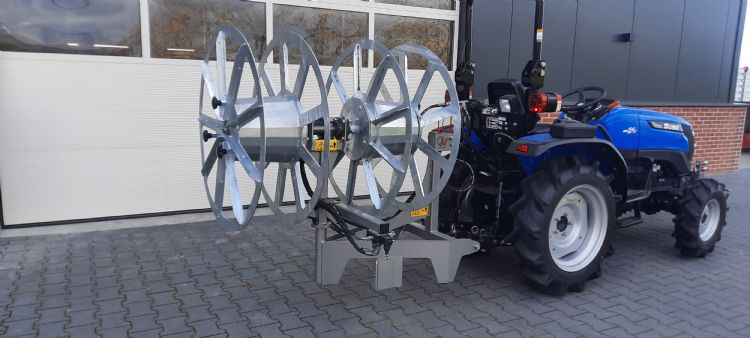 Slanghaspel om druppelslang op te rollen Slanghaspel om druppelslang op te rollen